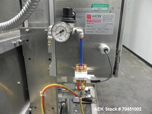 Used Axon Model EZ-100 Heat Shrink Tamper Evident Band & Sleeve Label Applicator. Rated up to 150 ppm depending on the container. Machine is of stainless steel construction. Sleeve size 20 to 100mm f...