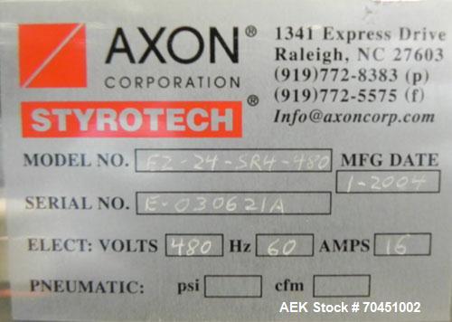 Used Axon Model EZ-100 Heat Shrink Tamper Evident Band & Sleeve Label Applicator. Rated up to 150 ppm depending on the container. Machine is of stainless steel construction. Sleeve size 20 to 100mm f...