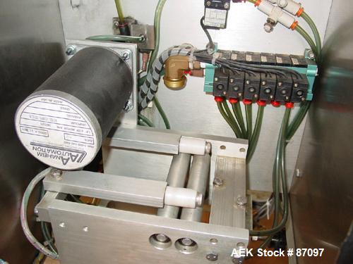 Used Axon Heat Shrink Tamper Evident Band & Sleeve Label Applicator, Model EZ100, Stainless Steel. Rated up to 150 ppm depending on the container. Sleeve size 20 to 100mm flat x 25 to 200mm high x 40...