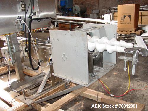 Used Axon EZ300 Stainless Steel Neck Bander With Stainless Steel Tunnel. Capable of speeds up to 70 containers per minute. Can handle product container widths from 2-3/8" to 7-3/8" and sleeve lay fla...
