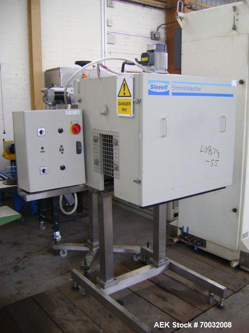 Used Sleevit Model SC100 Tamper Evident Neck Bander with.165MM maximum layflat, unlimited band length. Container / bandsize range of:20mm dia, 25mm length,at 50 cpm, up to to 100mm dia, 250mm length,...