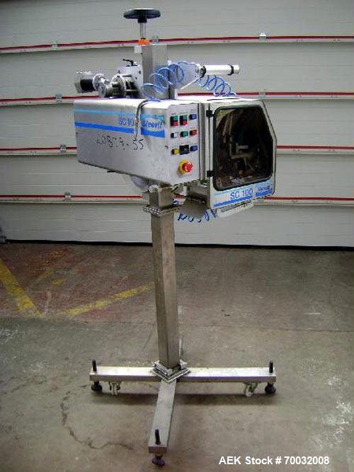 Used Sleevit Model SC100 Tamper Evident Neck Bander with.165MM maximum layflat, unlimited band length. Container / bandsize range of:20mm dia, 25mm length,at 50 cpm, up to to 100mm dia, 250mm length,...