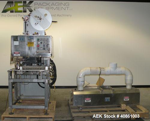 Used PDC 50 Tamper Evident Neck Bander and Shrink Sleeve Labeling Machine, capable of speeds from 50 to 130 CPM. Band/Sleeve size range: Diameter .375" to 3.00" or 10 to 75 MM; Band Height .625" to 7...