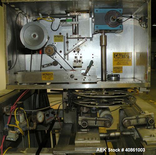 Used PDC 50 Tamper Evident Neck Bander and Shrink Sleeve Labeling Machine, capable of speeds from 50 to 130 CPM. Band/Sleeve size range: Diameter .375" to 3.00" or 10 to 75 MM; Band Height .625" to 7...