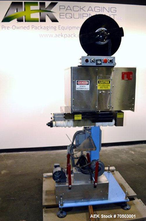 Used PDC Model 65M Tamper Evident Neck Banding Machine. Capable of speeds up to 200 bottles per minute. Band Diameter:3/8" to 3". Band Height 3/4" - 2". Set up for clear or continuous print film (no ...