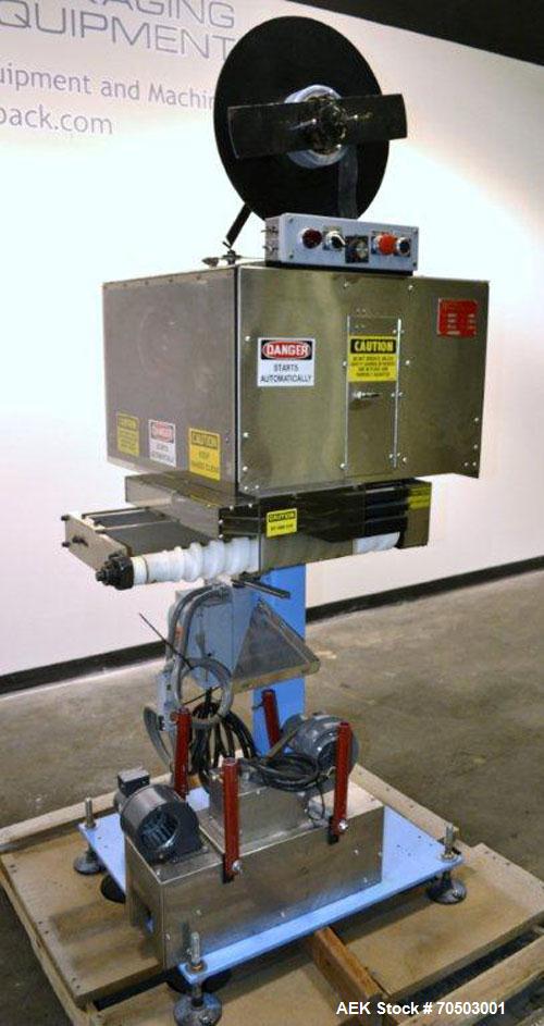 Used PDC Model 65M Tamper Evident Neck Banding Machine. Capable of speeds up to 200 bottles per minute. Band Diameter:3/8" to 3". Band Height 3/4" - 2". Set up for clear or continuous print film (no ...