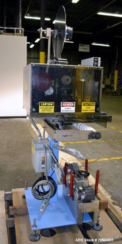 Used PDC Model 65M Tamper Evident Neck Banding Machine. Capable of speeds up to 200 bottles per minute. Band Diameter:3/8" to 3". Band Height 3/4" - 2". Set up for clear or continuous print film (no ...