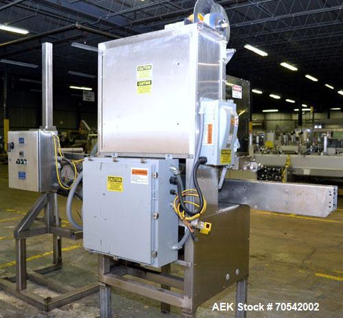 Used PDC Model 75-M Tamper Evident Neck Bander. Capable of speeds up to 300 bottles per minute. Band size range: (Diameter) 3/8" to 3", (Height) 3/4" to 2". Band cut off: Unregistered. Has wormscrew ...