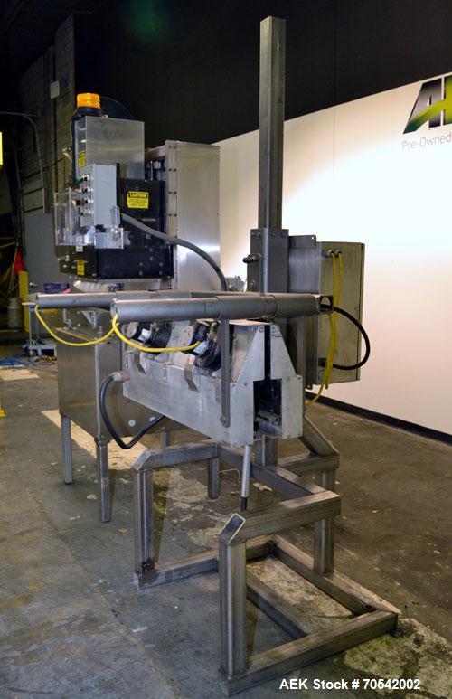 Used PDC Model 75-M Tamper Evident Neck Bander. Capable of speeds up to 300 bottles per minute. Band size range: (Diameter) 3/8" to 3", (Height) 3/4" to 2". Band cut off: Unregistered. Has wormscrew ...