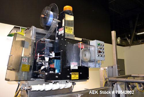 Used PDC Model 75-M Tamper Evident Neck Bander. Capable of speeds up to 300 bottles per minute. Band size range: (Diameter) 3/8" to 3", (Height) 3/4" to 2". Band cut off: Unregistered. Has wormscrew ...