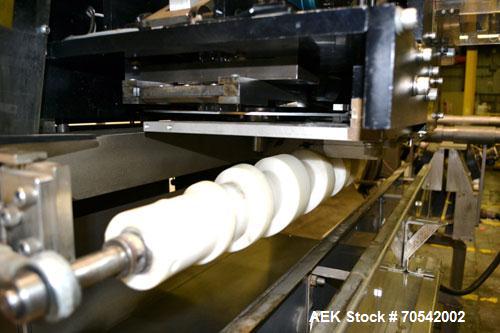 Used PDC Model 75-M Tamper Evident Neck Bander. Capable of speeds up to 300 bottles per minute. Band size range: (Diameter) 3/8" to 3", (Height) 3/4" to 2". Band cut off: Unregistered. Has wormscrew ...