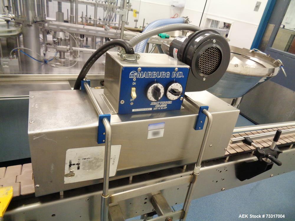 Used Pharmafill (Dietz) Model NB1 Automatic Neck Bander and Shrink Tunnel. Capable of speeds up to 100 BPM (Depending on application). Cap size range: 14mm - 76mm (diameter). Has perforation and prin...