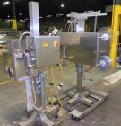 Used Axon Model EZ-100 Heat Shrink Tamper Evident Band & Sleeve Label Applicator. Rated up to 150 ppm depending on the container. Machine is of stainless steel construction. Sleeve size 20 to 100mm f...