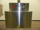 Used Axon Model EZ-100 Heat Shrink Tamper Evident Band & Sleeve Label Applicator. Rated up to 150 ppm depending on the container. Machine is of stainless steel construction. Sleeve size 20 to 100mm f...