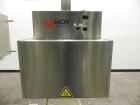 Used Axon Model EZ-100 Heat Shrink Tamper Evident Band & Sleeve Label Applicator. Rated up to 150 ppm depending on the container. Machine is of stainless steel construction. Sleeve size 20 to 100mm f...