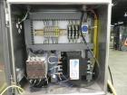 Used Axon Model EZ-100 Heat Shrink Tamper Evident Band & Sleeve Label Applicator. Rated up to 150 ppm depending on the container. Machine is of stainless steel construction. Sleeve size 20 to 100mm f...
