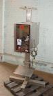 Used Axon Heat Shrink Tamper Evident Band & Sleeve Label Applicator, Model EZ100, Stainless Steel. Rated up to 150 ppm depending on the container. Sleeve size 20 to 100mm flat x 25 to 200mm high x 40...