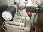 Used Axon Heat Shrink Tamper Evident Band & Sleeve Label Applicator, Model EZ100, Stainless Steel. Rated up to 150 ppm depending on the container. Sleeve size 20 to 100mm flat x 25 to 200mm high x 40...
