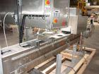 Used Axon EZ300 Stainless Steel Neck Bander With Stainless Steel Tunnel. Capable of speeds up to 70 containers per minute. Can handle product container widths from 2-3/8