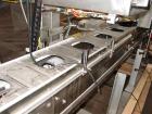 Used Axon EZ300 Stainless Steel Neck Bander With Stainless Steel Tunnel. Capable of speeds up to 70 containers per minute. Can handle product container widths from 2-3/8