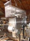Used Axon EZ300 Stainless Steel Neck Bander With Stainless Steel Tunnel. Capable of speeds up to 70 containers per minute. Can handle product container widths from 2-3/8