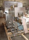 Used Axon EZ-2-400 Twin Head Stainless Steel Neck Bander With Twin Stainless Steel Heat Tunnels. Capable of speeds up to 90 CPM. Container size range widths from 3-11/16
