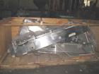 Used Kalsih Bandit Neck Bander, model 5400. Manually adjustable size range, and height. Driven by a 1/6hp, 1/60/120 volt motor. Mounted on a stainless steel frame. Built 1993
