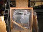 Used Kalsih Bandit Neck Bander, model 5400. Manually adjustable size range, and height. Driven by a 1/6hp, 1/60/120 volt motor. Mounted on a stainless steel frame. Built 1993