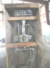 Used Kalsih Bandit Neck Bander, model 5400. Manually adjustable size range, and height. Driven by a 1/6hp, 1/60/120 volt motor. Mounted on a stainless steel frame. Built 1993