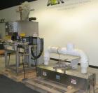 Used PDC 50 Tamper Evident Neck Bander and Shrink Sleeve Labeling Machine, capable of speeds from 50 to 130 CPM. Band/Sleeve size range: Diameter .375