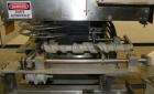 Used PDC 50 Tamper Evident Neck Bander and Shrink Sleeve Labeling Machine, capable of speeds from 50 to 130 CPM. Band/Sleeve size range: Diameter .375