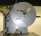 Used PDC 50 Tamper Evident Neck Bander and Shrink Sleeve Labeling Machine, capable of speeds from 50 to 130 CPM. Band/Sleeve size range: Diameter .375
