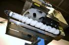 Used PDC Model 65M Tamper Evident Neck Banding Machine. Capable of speeds up to 200 bottles per minute. Band Diameter:3/8