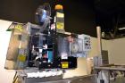 Used PDC Model 75-M Tamper Evident Neck Bander. Capable of speeds up to 300 bottles per minute. Band size range: (Diameter) 3/8