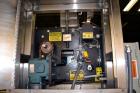 Used PDC Model 75-M Tamper Evident Neck Bander. Capable of speeds up to 300 bottles per minute. Band size range: (Diameter) 3/8