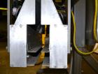 Used PDC Model 75-M Tamper Evident Neck Bander. Capable of speeds up to 300 bottles per minute. Band size range: (Diameter) 3/8