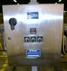 Used PDC Model 75-M Tamper Evident Neck Bander. Capable of speeds up to 300 bottles per minute. Band size range: (Diameter) 3/8
