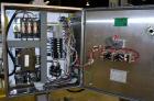 Used PDC Model 75-M Tamper Evident Neck Bander. Capable of speeds up to 300 bottles per minute. Band size range: (Diameter) 3/8