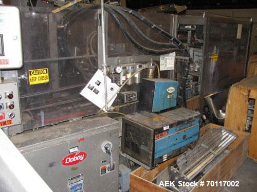 Used Used: Doboy Model 840 Triseal Carton top closer capable of speeds up to 60 CPM. Has carton size range: (length) 4" to 12" (width) 2" to 9" (height) 1-7/8" to 5". Has Nordson hot melt glue system.