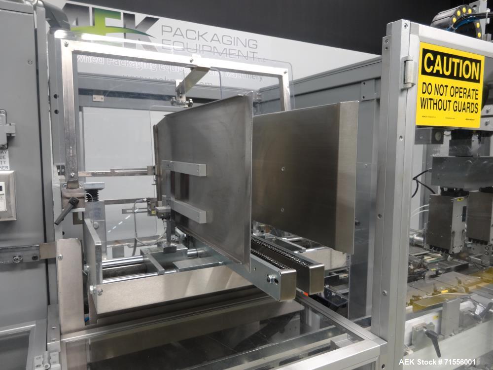 Used IMA Model FR100 Hooded Style Tray Former and Packer with Bottle Loader