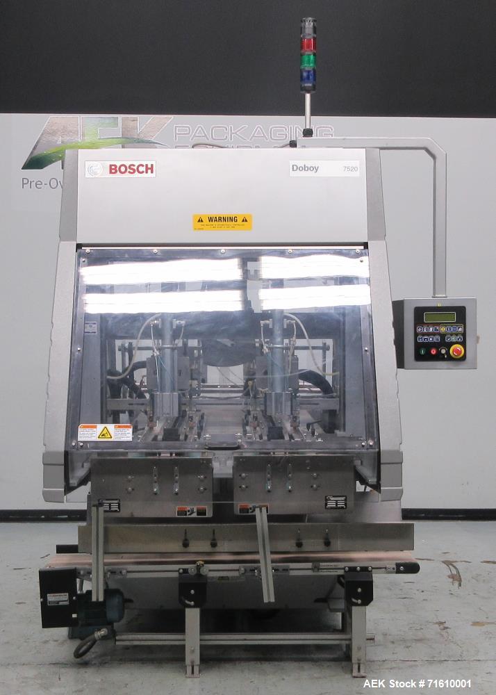 Used Bosch (Doboy) Model 7520 Automatic Dual Head Tray Former and Top Load Carton Former. Capable of speeds from 50 - 150 Trays/Cartons per minute (depending on application). Set up with Nordson Pro ...