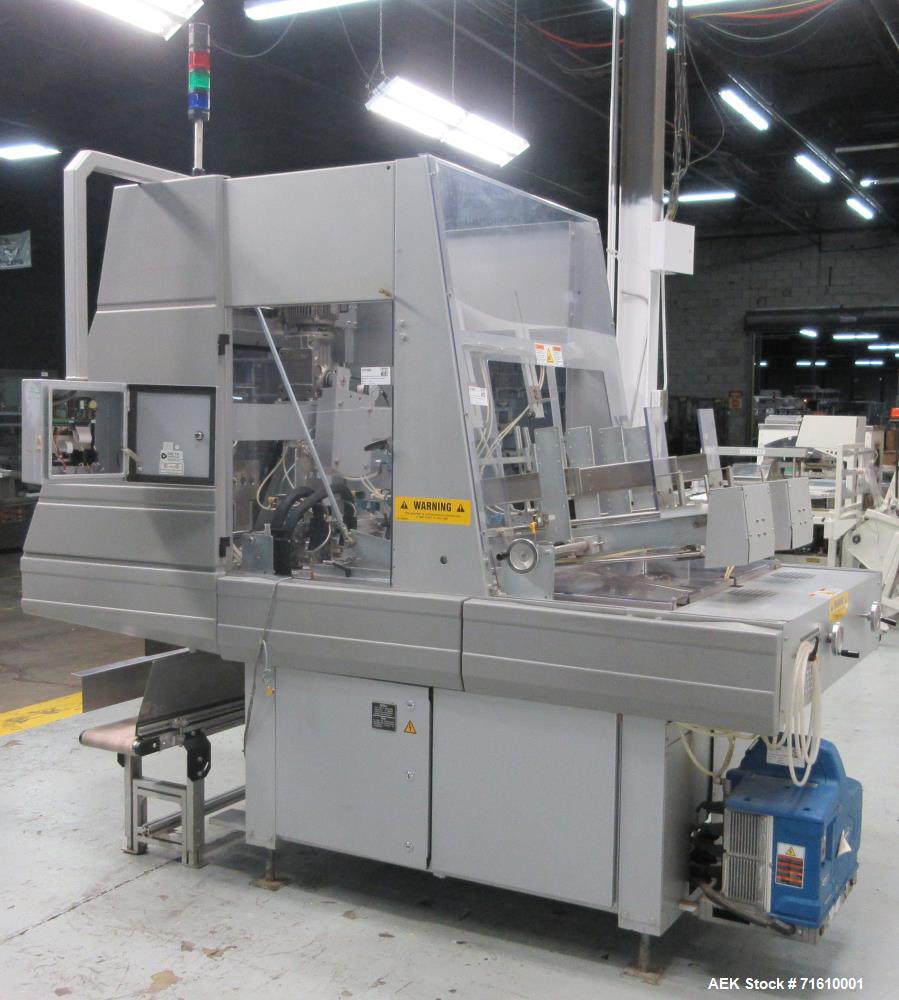 Used Bosch (Doboy) Model 7520 Automatic Dual Head Tray Former and Top Load Carton Former. Capable of speeds from 50 - 150 Trays/Cartons per minute (depending on application). Set up with Nordson Pro ...