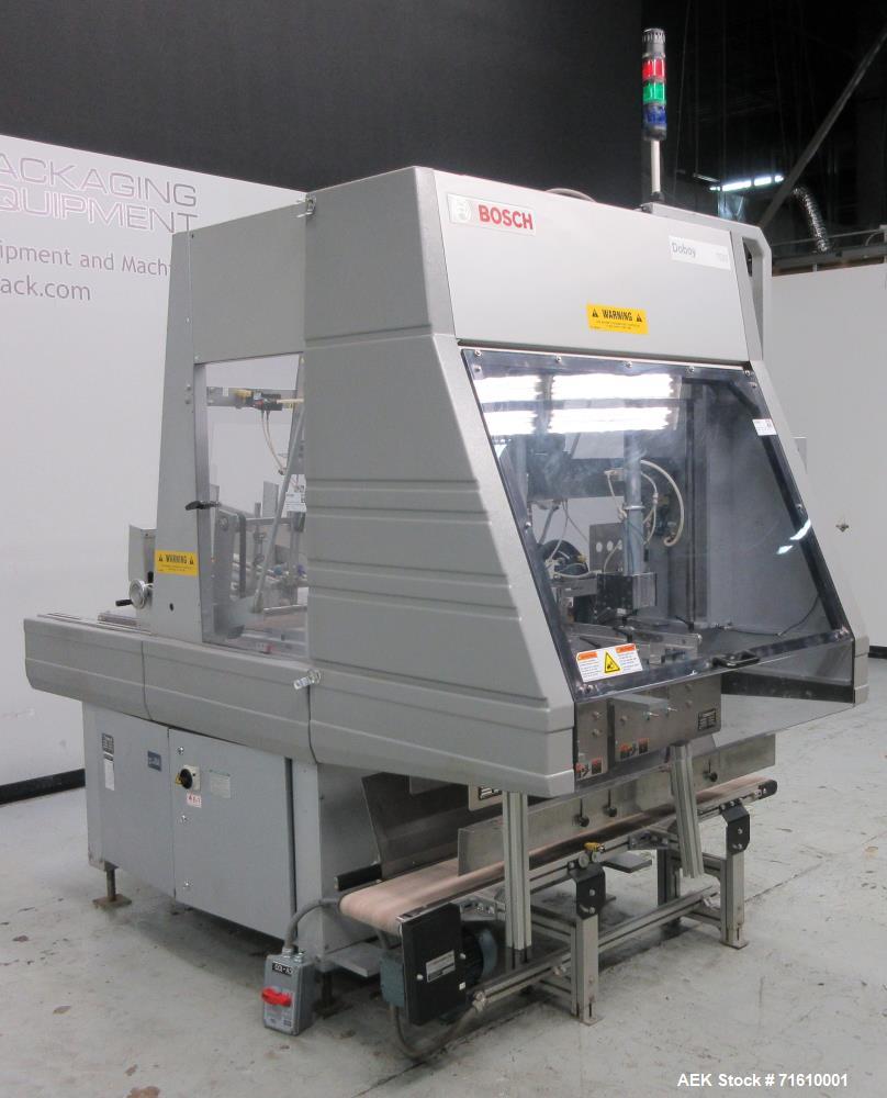 Used Bosch (Doboy) Model 7520 Automatic Dual Head Tray Former and Top Load Carton Former. Capable of speeds from 50 - 150 Trays/Cartons per minute (depending on application). Set up with Nordson Pro ...
