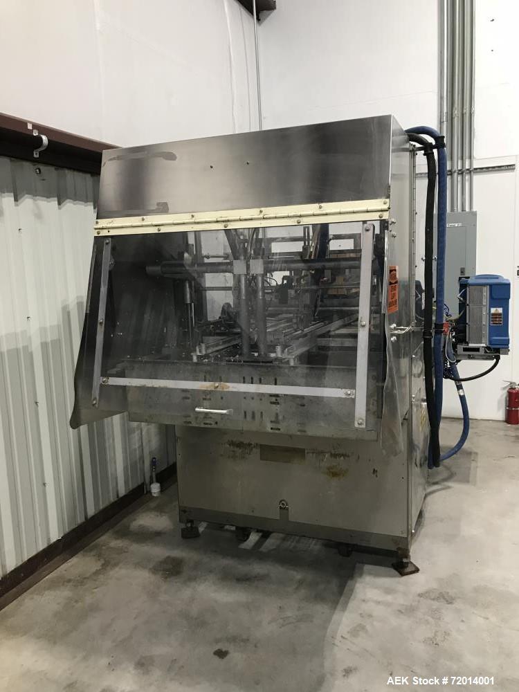 Used- Doboy Tray Former, Model 751. Single mandrel former with hot melt. Relay logic for controls. Nordson ProBlue 10 hot me...