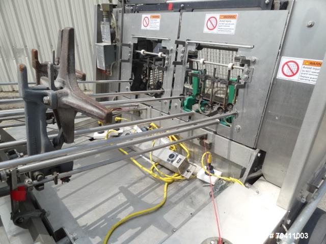 Used Klik Lok Dual Head Tray Former; Model KFWD. Stainless steel construction. Dual forming chambers, self locking style system. Speeds from 35-60 cycles/min. Size range  Length: 5" to 13", Width 4" ...