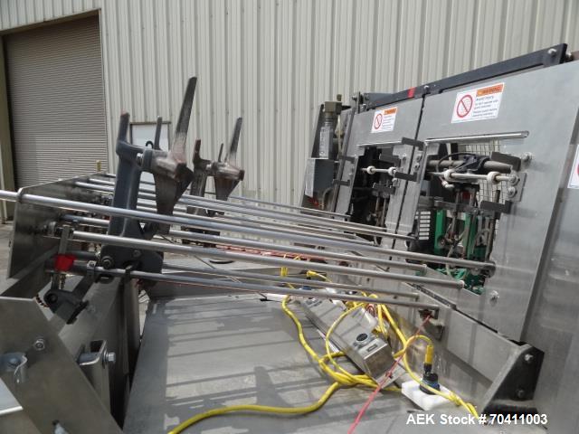 Used Klik Lok Dual Head Tray Former; Model KFWD. Stainless steel construction. Dual forming chambers, self locking style system. Speeds from 35-60 cycles/min. Size range  Length: 5" to 13", Width 4" ...