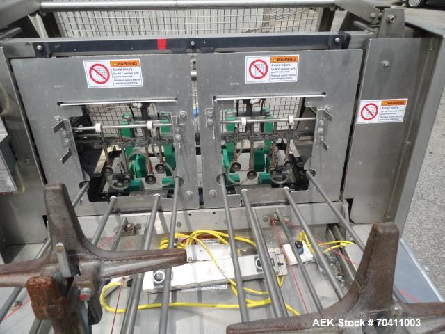 Used Klik Lok Dual Head Tray Former; Model KFWD. Stainless steel construction. Dual forming chambers, self locking style system. Speeds from 35-60 cycles/min. Size range  Length: 5" to 13", Width 4" ...