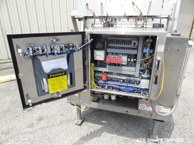 Used Klik Lok Dual Head Tray Former; Model KFWD. Stainless steel construction. Dual forming chambers, self locking style system. Speeds from 35-60 cycles/min. Size range  Length: 5" to 13", Width 4" ...