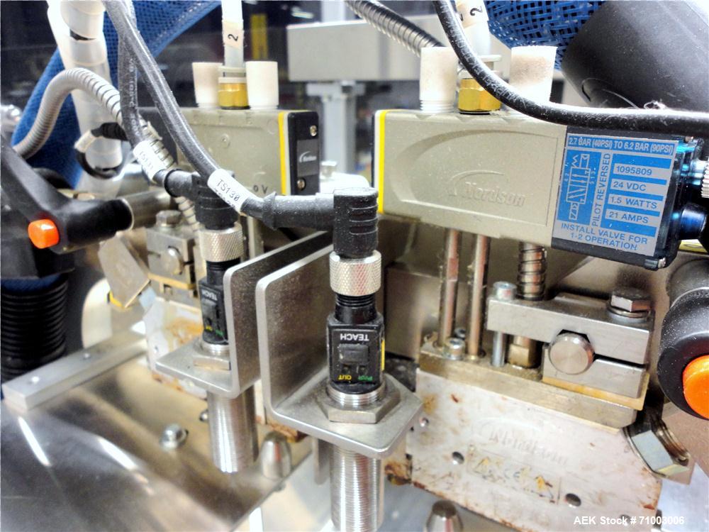 Used MGS Model TLC Top Load Cartoner with Robotic Pick and Place Unit