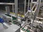 Used IMA Model FR100 Hooded Style Tray Former and Packer with Bottle Loader
